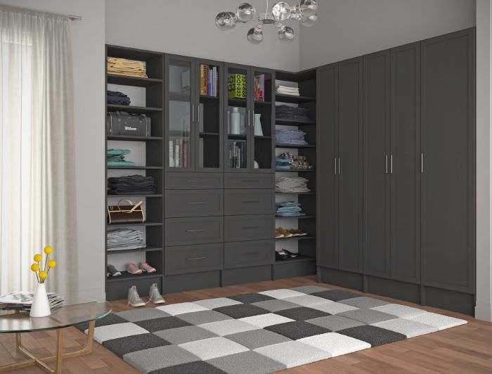 Grey wooden closet and built-in shelves & drawers. 
